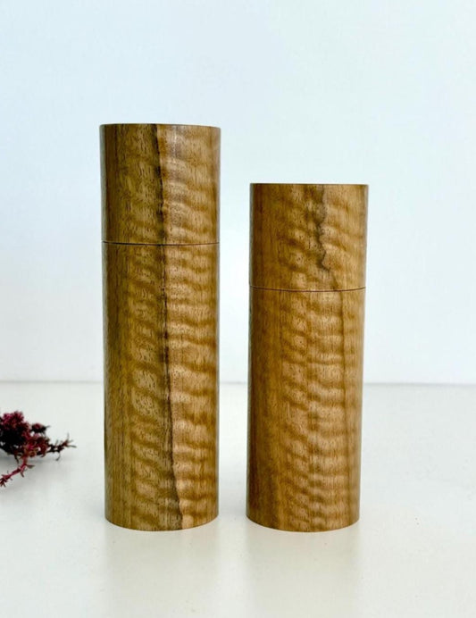 Wooden cylindrical shape salt and pepper grinders made from Marri timber
