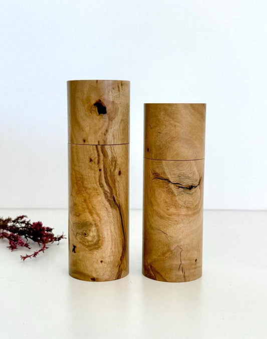 Wooden cylindrical shape salt and pepper grinders made from Lemon scented gum