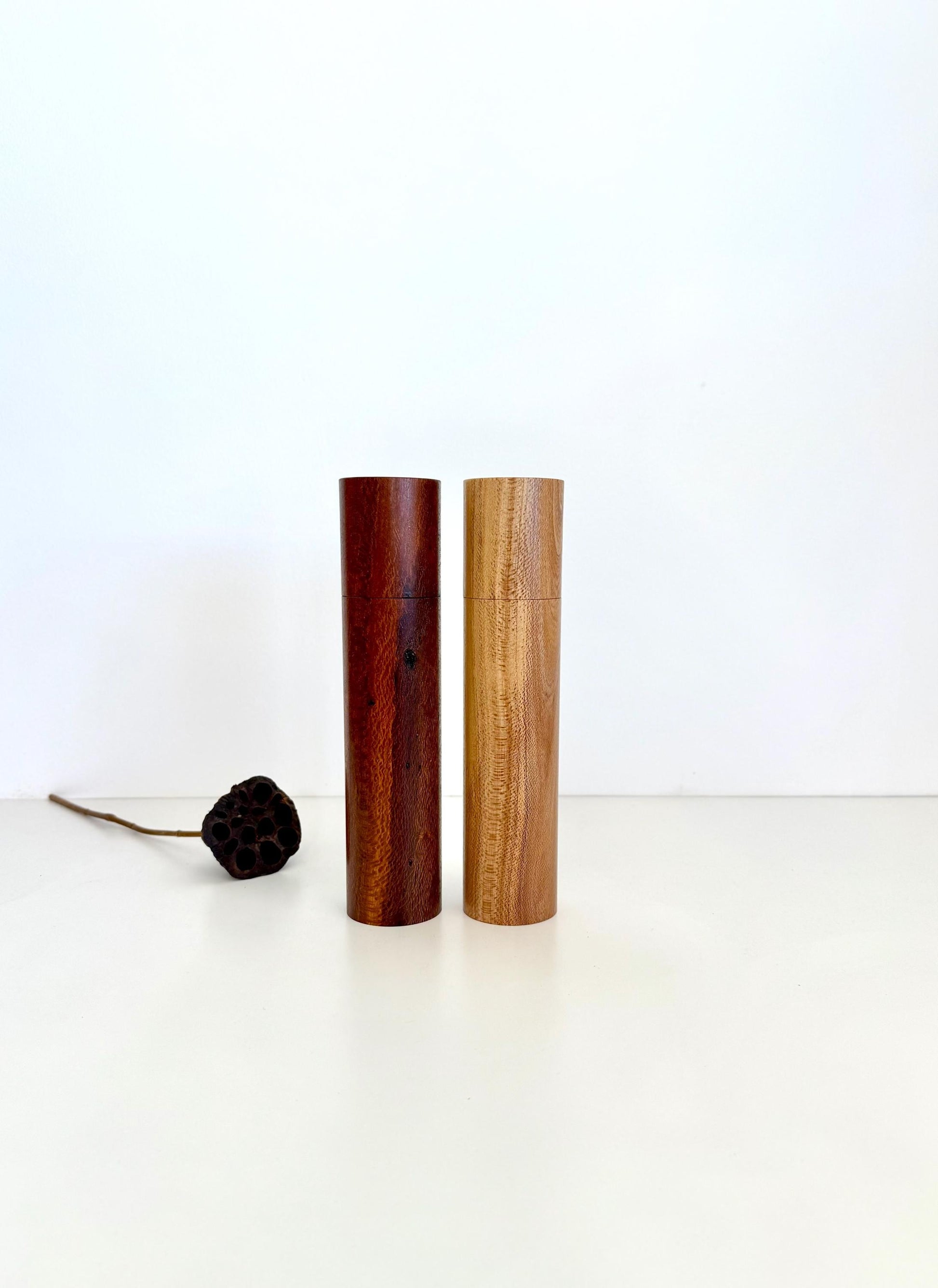 Wooden cylindrical shape salt and pepper grinders made from Banksia timber