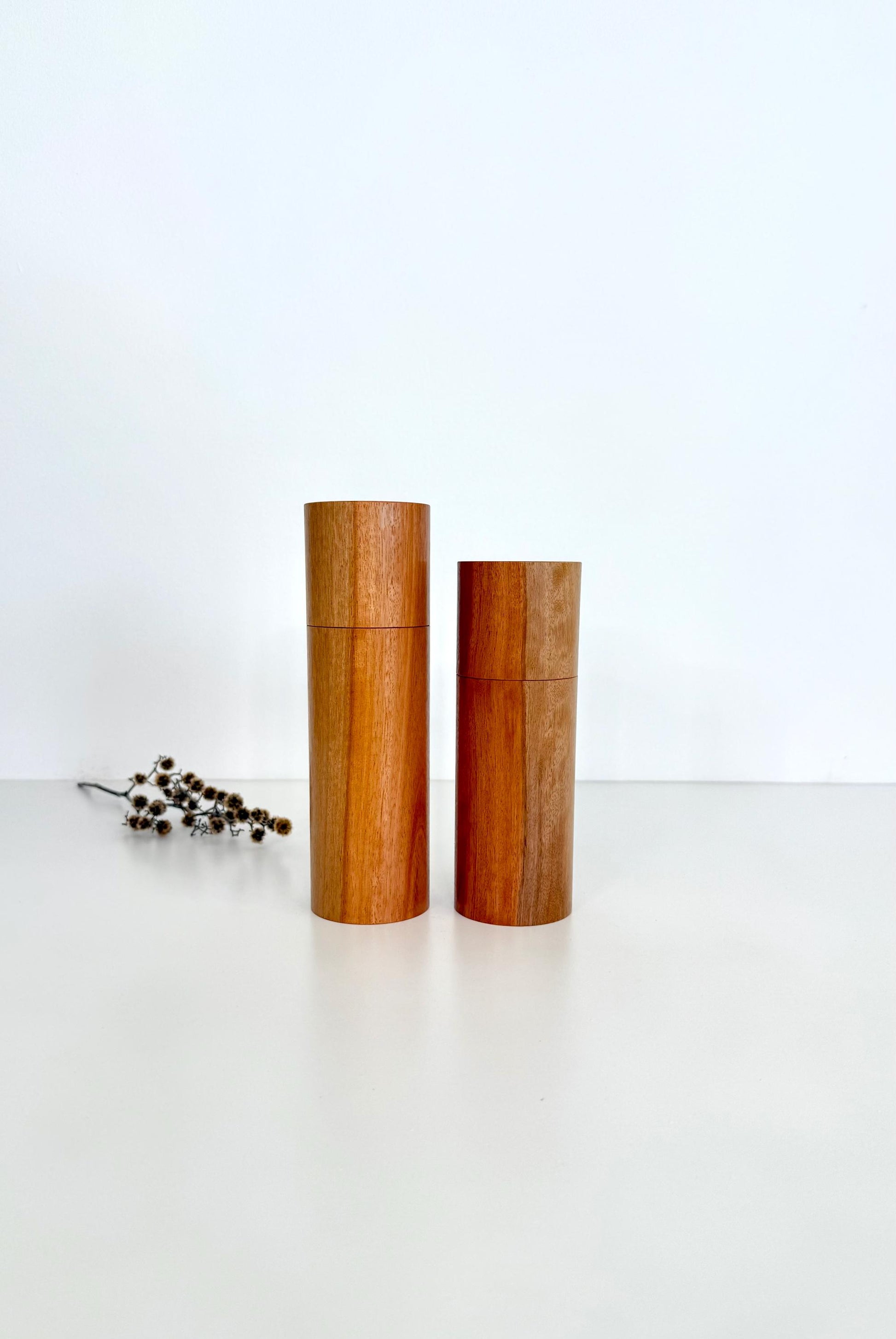 Wooden cylindrical shape salt and pepper grinders made from River Red gum timber
