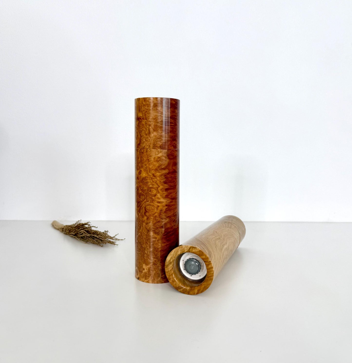 Bottom of salt and pepper grinder showing Crushgrind ceramic grinding mechanism and the adjustment knob