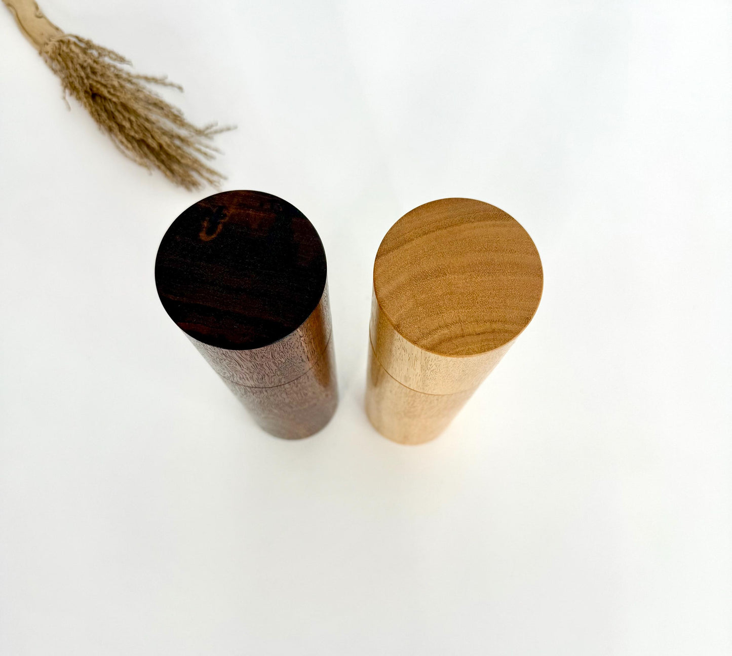 Birdseye view of wooden cylindrical shape salt and pepper grinders made from Australian Jarrah and Blackbutt timbers