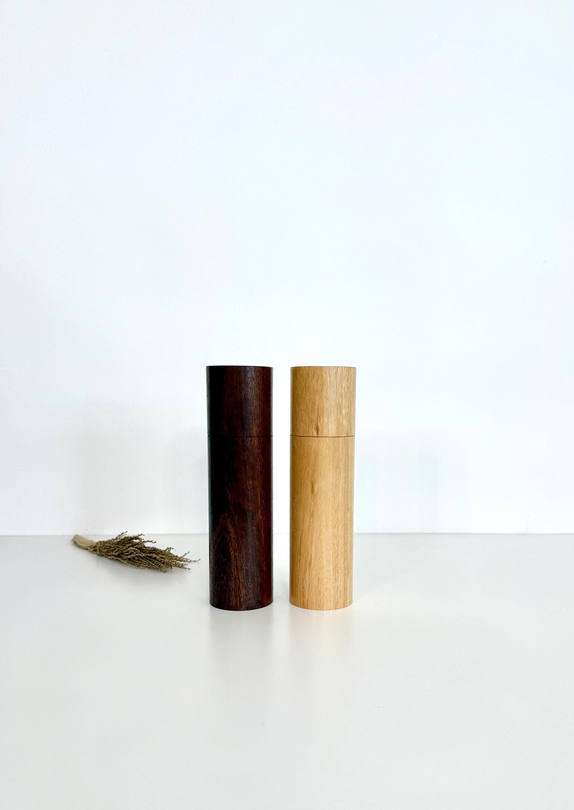 Wooden cylindrical shape salt and pepper grinders made from Jarrah and Blackbutt timbers