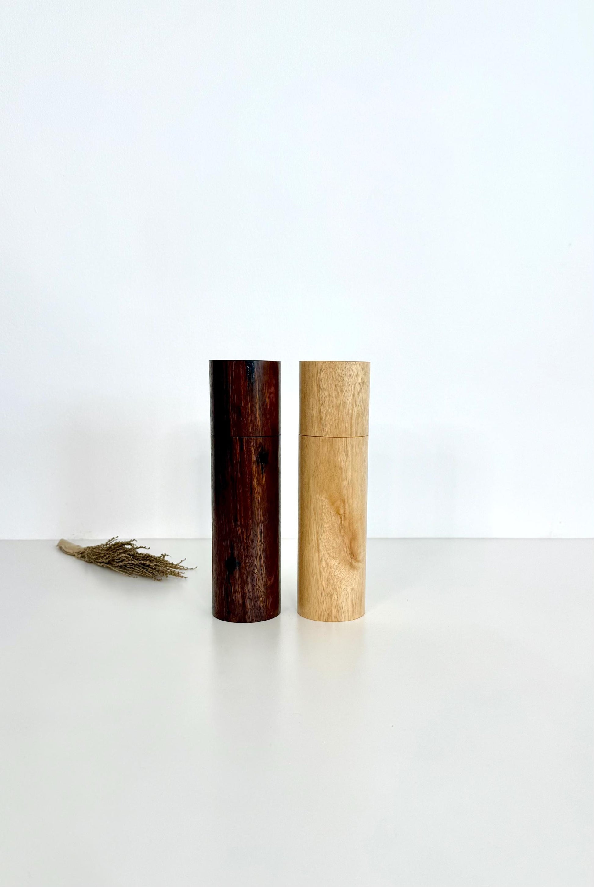 Wooden cylindrical shape salt and pepper grinders made from Jarrah and Blackbutt timbers