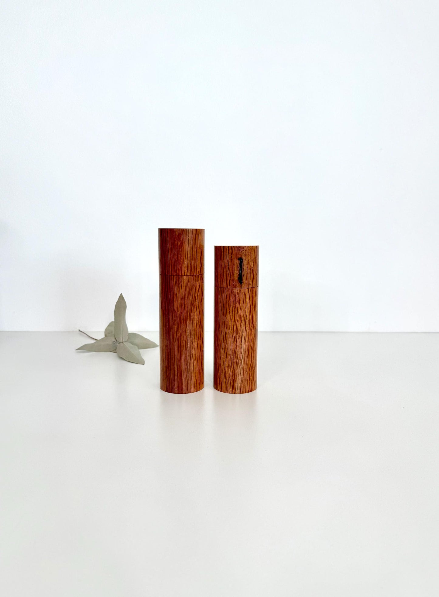 Wooden cylindrical shape salt and pepper grinders made from Sheoak timber