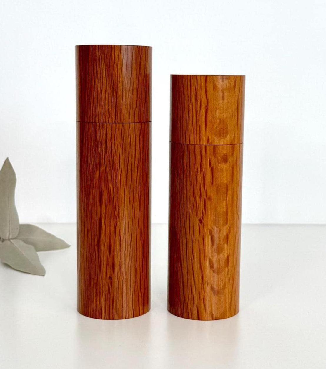 Wooden cylindrical shape salt and pepper grinders made from Sheoak timber