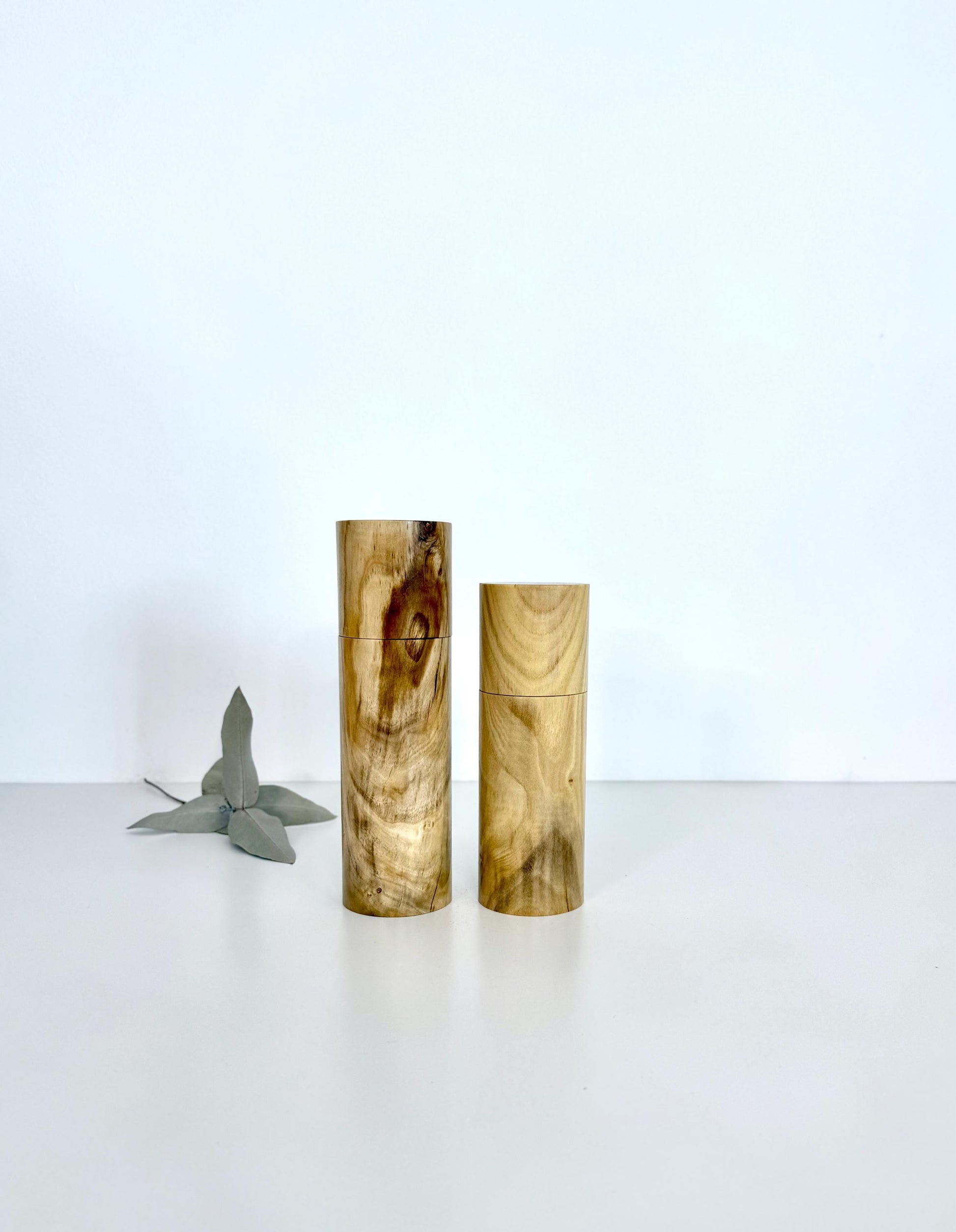 Wooden cylindrical shape salt and pepper grinders made from Pistachio timber