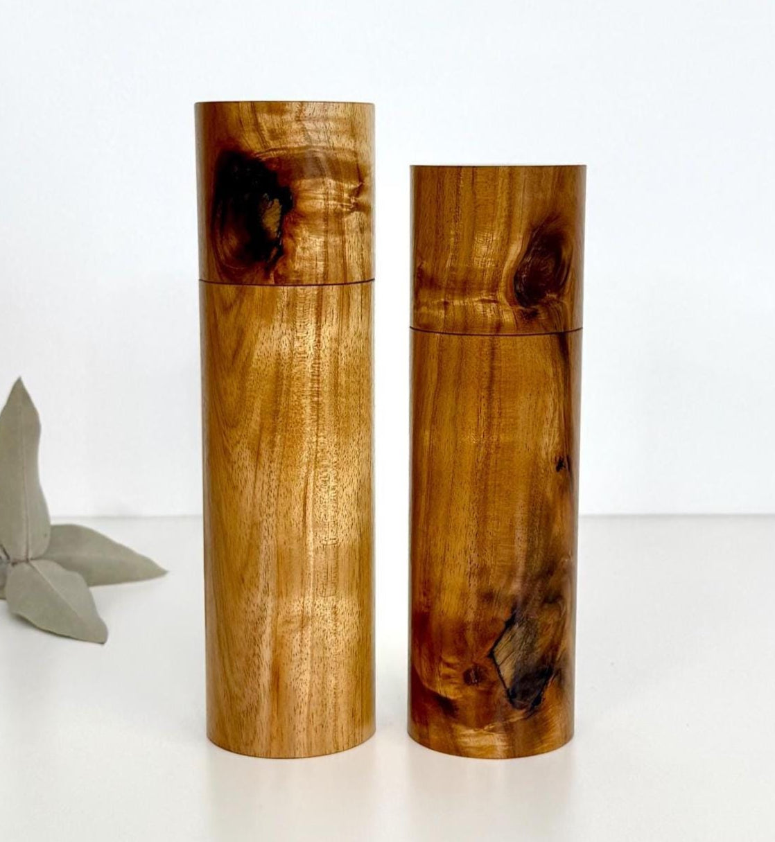 Wooden cylindrical shape salt and pepper grinders made from Black wattle timber