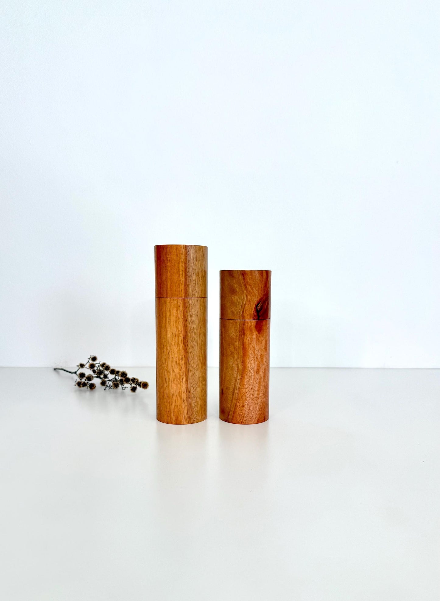 Wooden cylindrical shape salt and pepper grinders made from River Red gum timber
