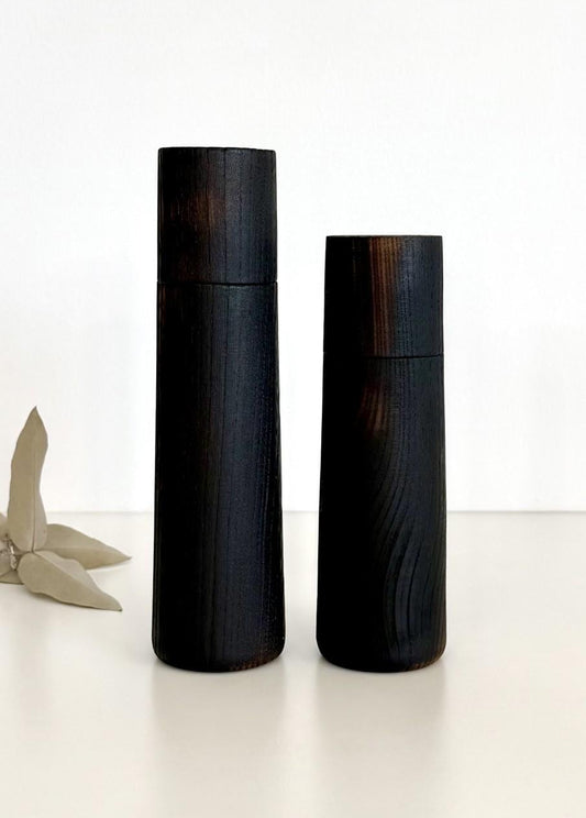 Wooden cylindrical shape salt and pepper grinders made from Elm timber