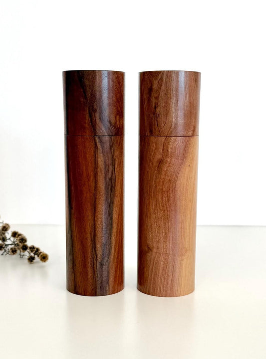 Wooden cylindrical shape salt and pepper grinders made from Peppermint timber