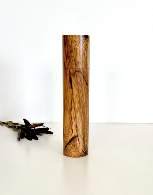Wooden cylindrical shape salt and pepper grinder made from Olive timber