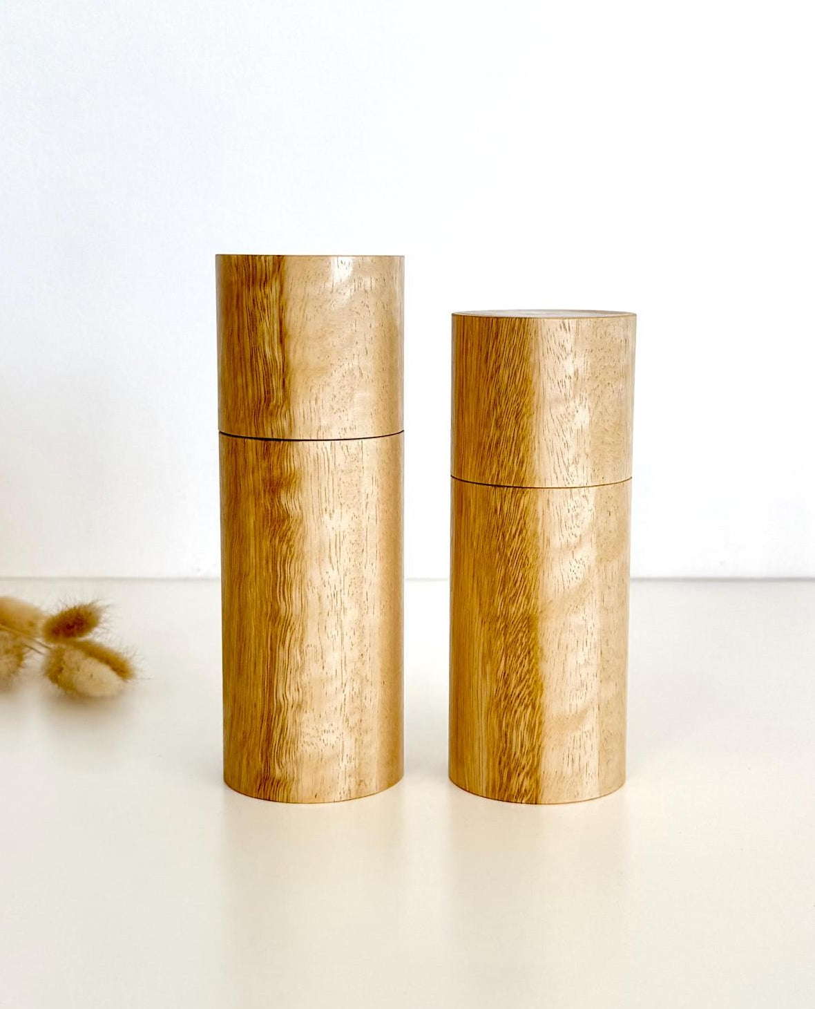 Wooden cylindrical shape salt and pepper grinders made from Yellow Tingle timber