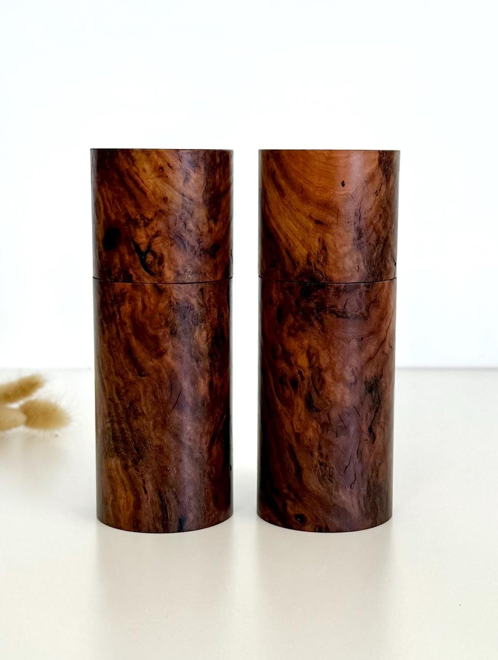 Wooden cylindrical shape salt and pepper grinders made from Gimlet timber