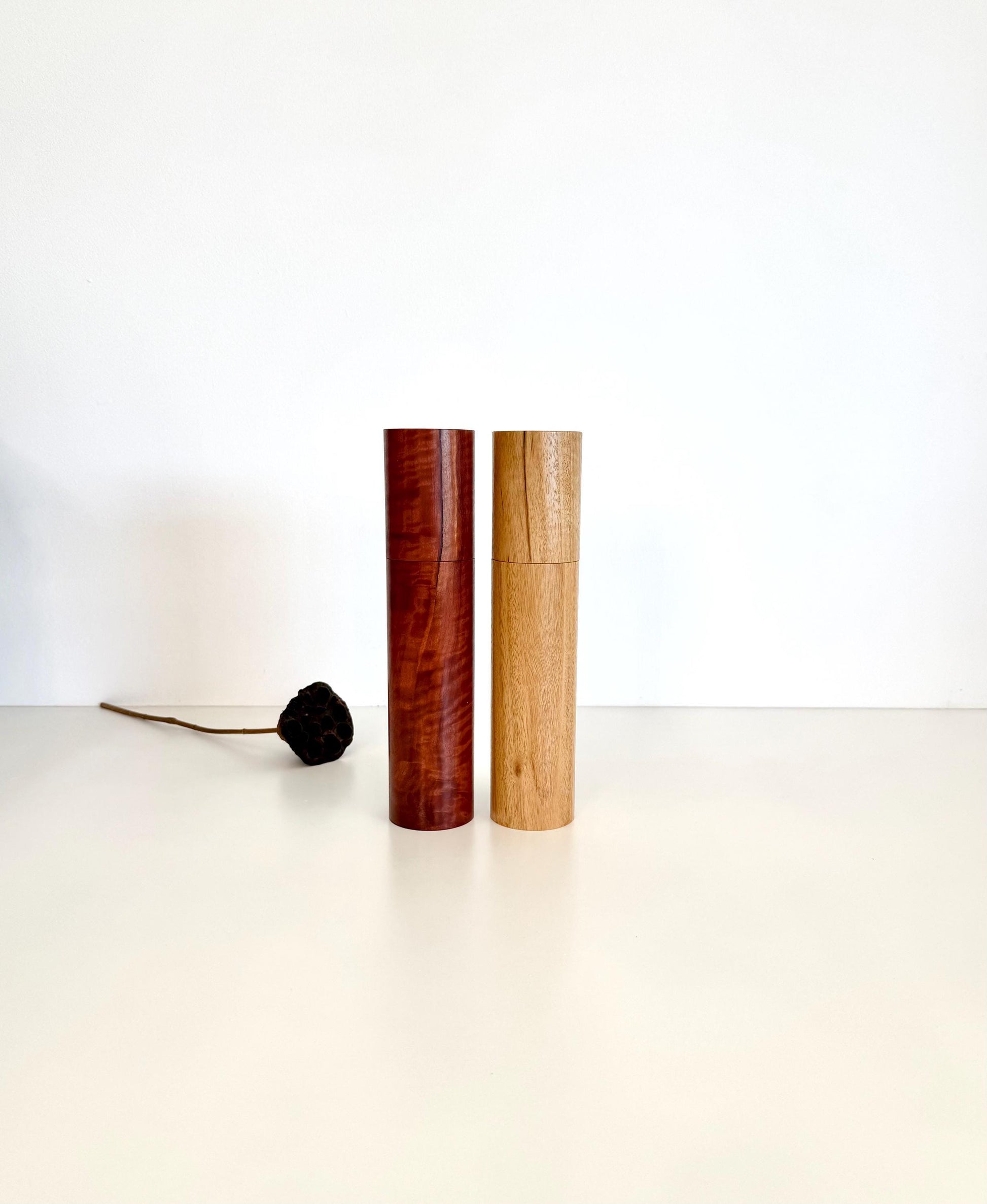 Wooden cylindrical shape salt and pepper grinders made from Jarrah and Blackbutt timbers