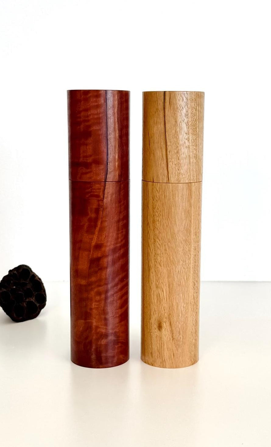 Wooden cylindrical shape salt and pepper grinders made from Jarrah and Blackbutt timbers
