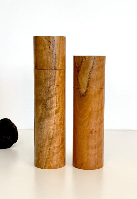 Wooden cylindrical shape salt and pepper grinders made from blackbutt timber