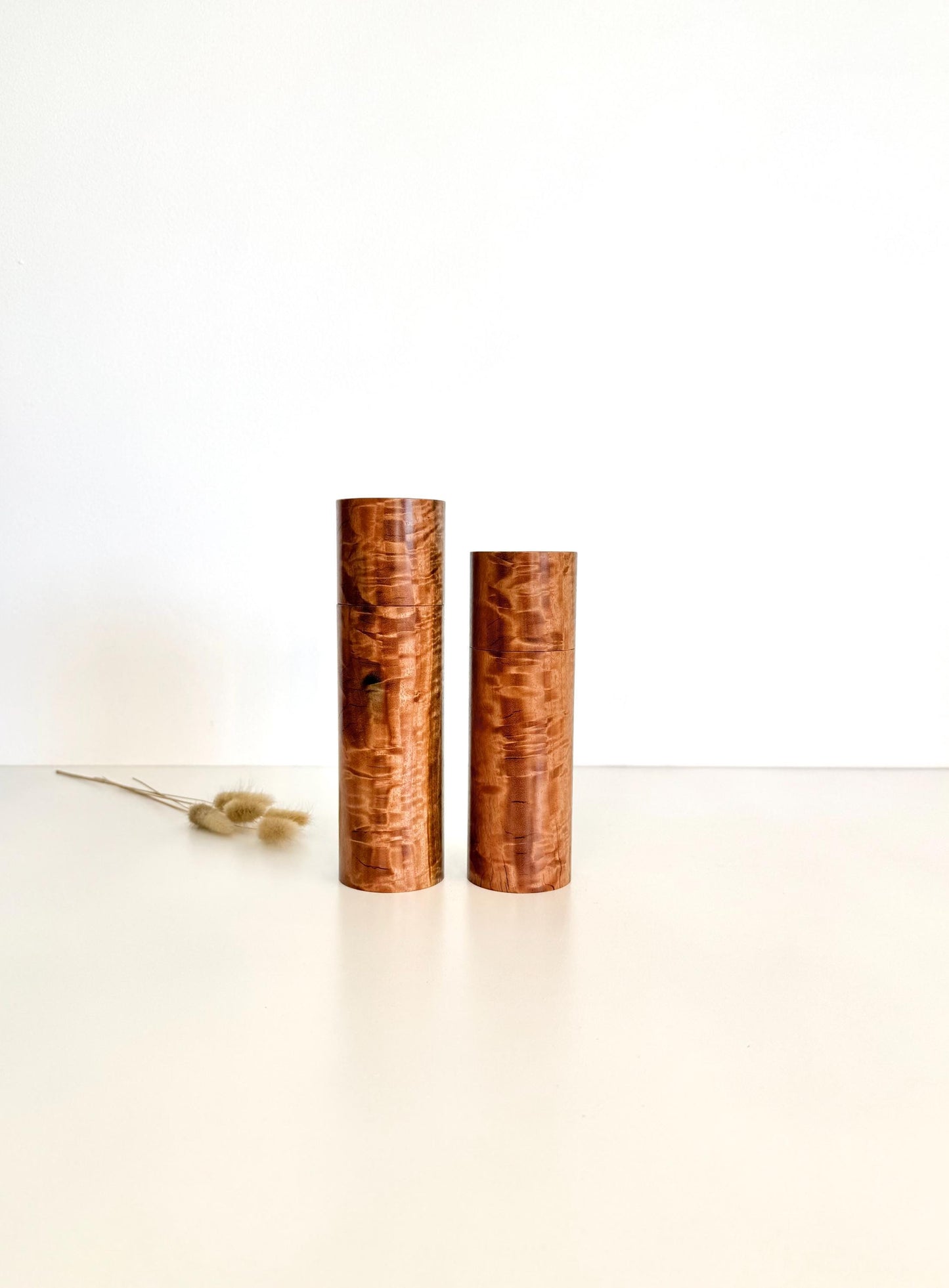 Wooden cylindrical shape salt and pepper grinders made from river red gum timber