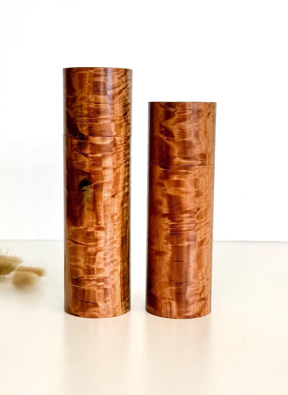Wooden cylindrical shape salt and pepper grinders made from river red gum timber