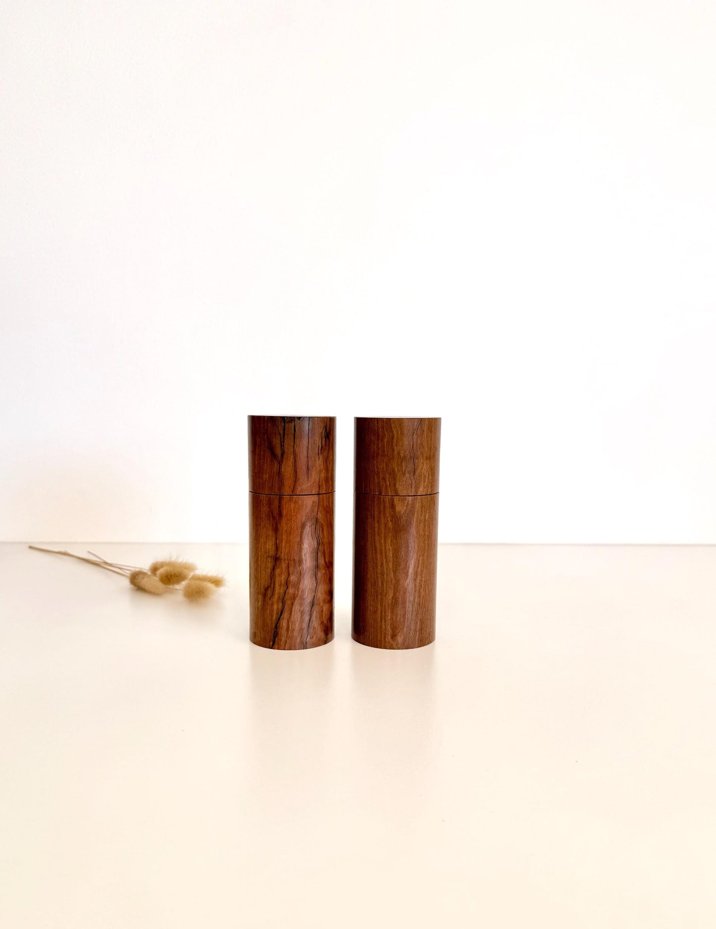 Wooden cylindrical shape salt and pepper grinders made from Blackbutt timber