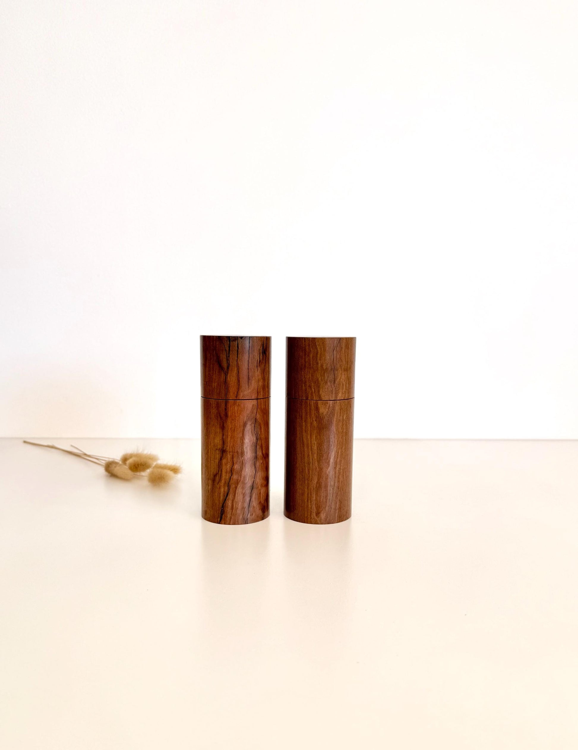 Wooden cylindrical shape salt and pepper grinders made from Blackbutt timber