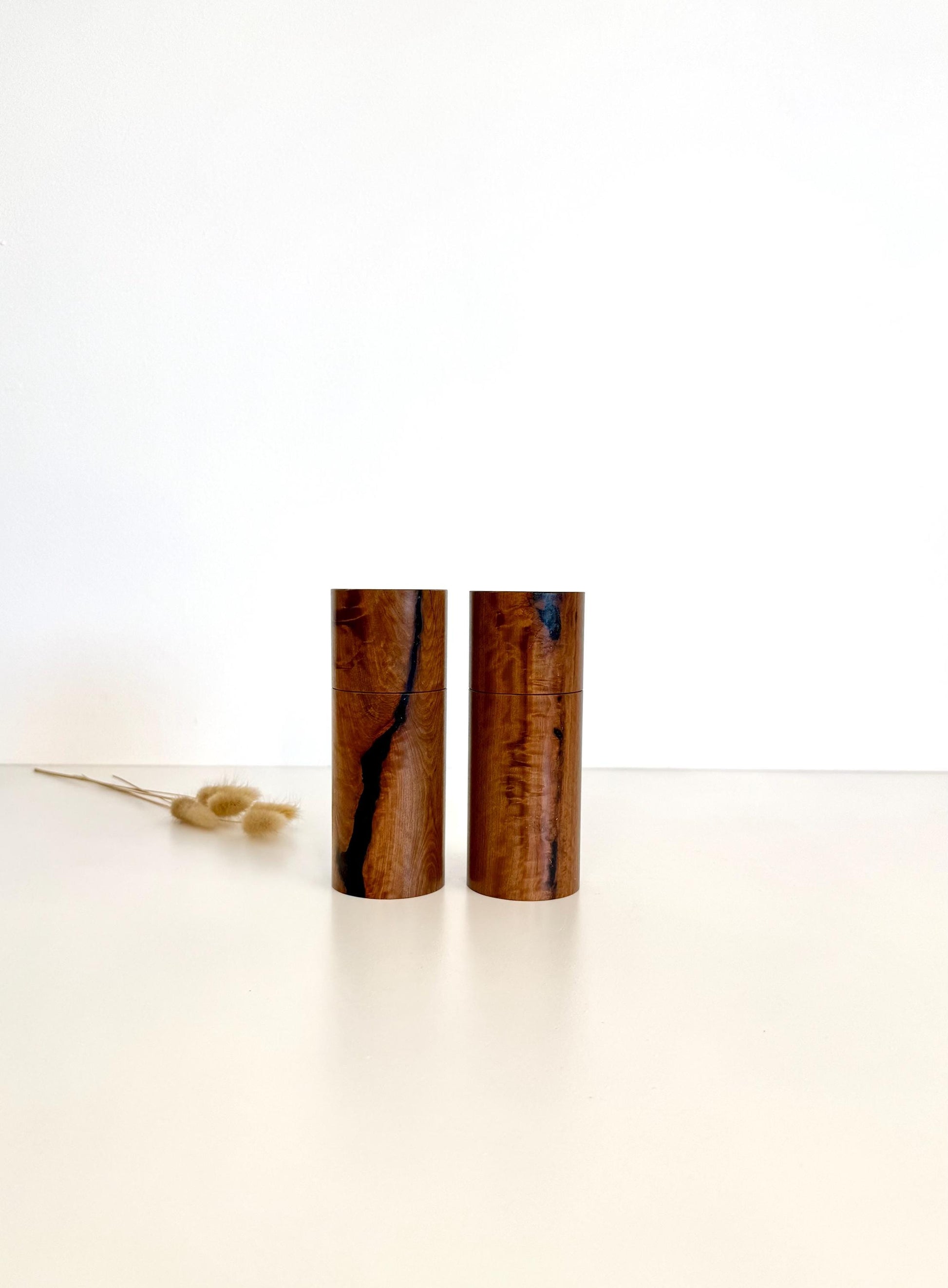 Wooden cylindrical shape salt and pepper grinders made from Blackbutt timber
