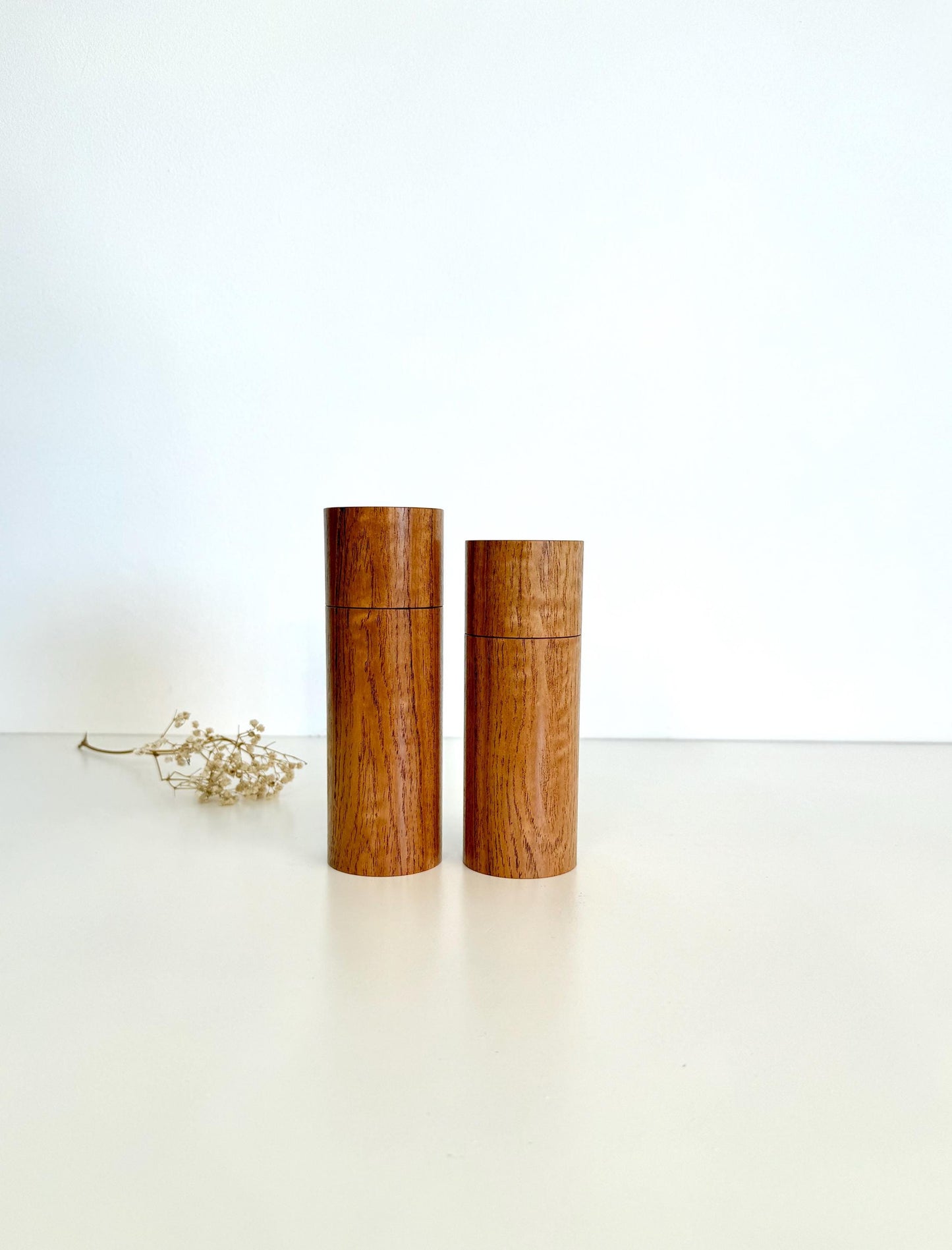 Wooden cylindrical shape salt and pepper grinders made from Cape Lilac timber