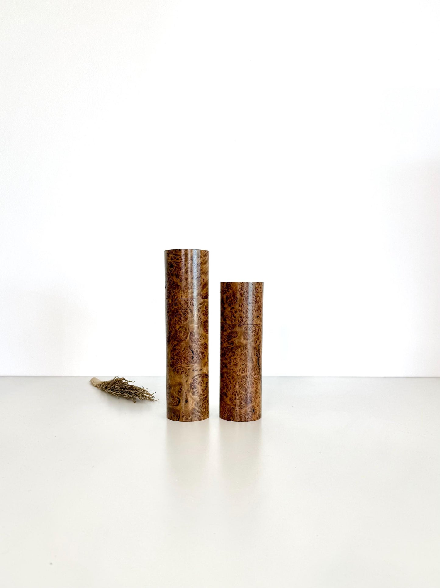 Wooden cylindrical shape salt and pepper grinders made from York Gum Burl timber