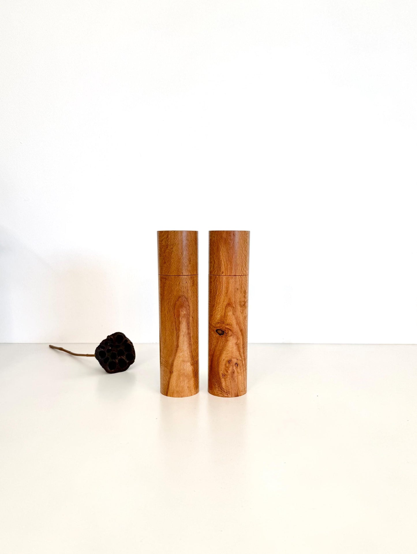 Wooden cylindrical shape salt and pepper grinders made from River banksia timber