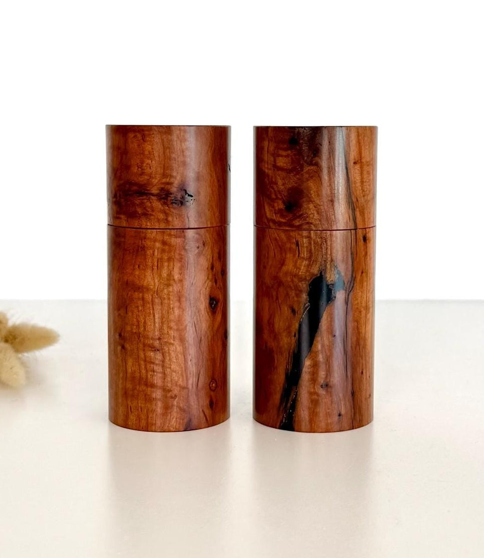 Wooden cylindrical shape salt and pepper grinders made from Mallee timber