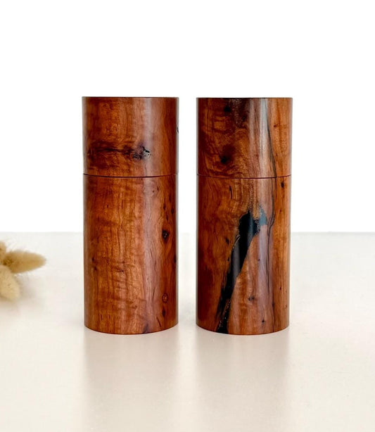 Wooden cylindrical shape salt and pepper grinders made from Mallee timber