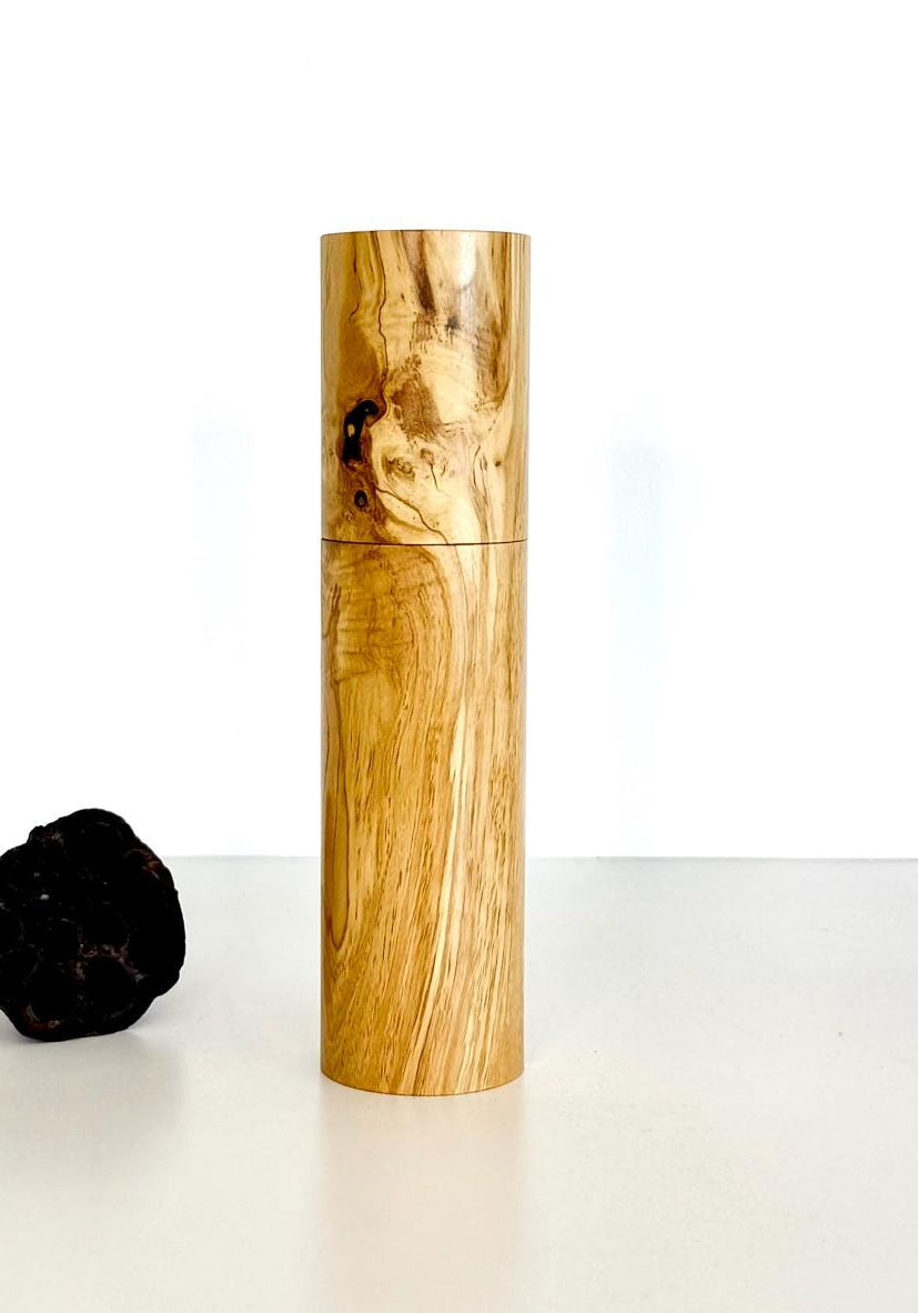 Wooden cylindrical shape salt and pepper grinder made from Olive timber