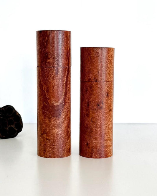 Wooden cylindrical shape salt and pepper grinders made from Banksia timber