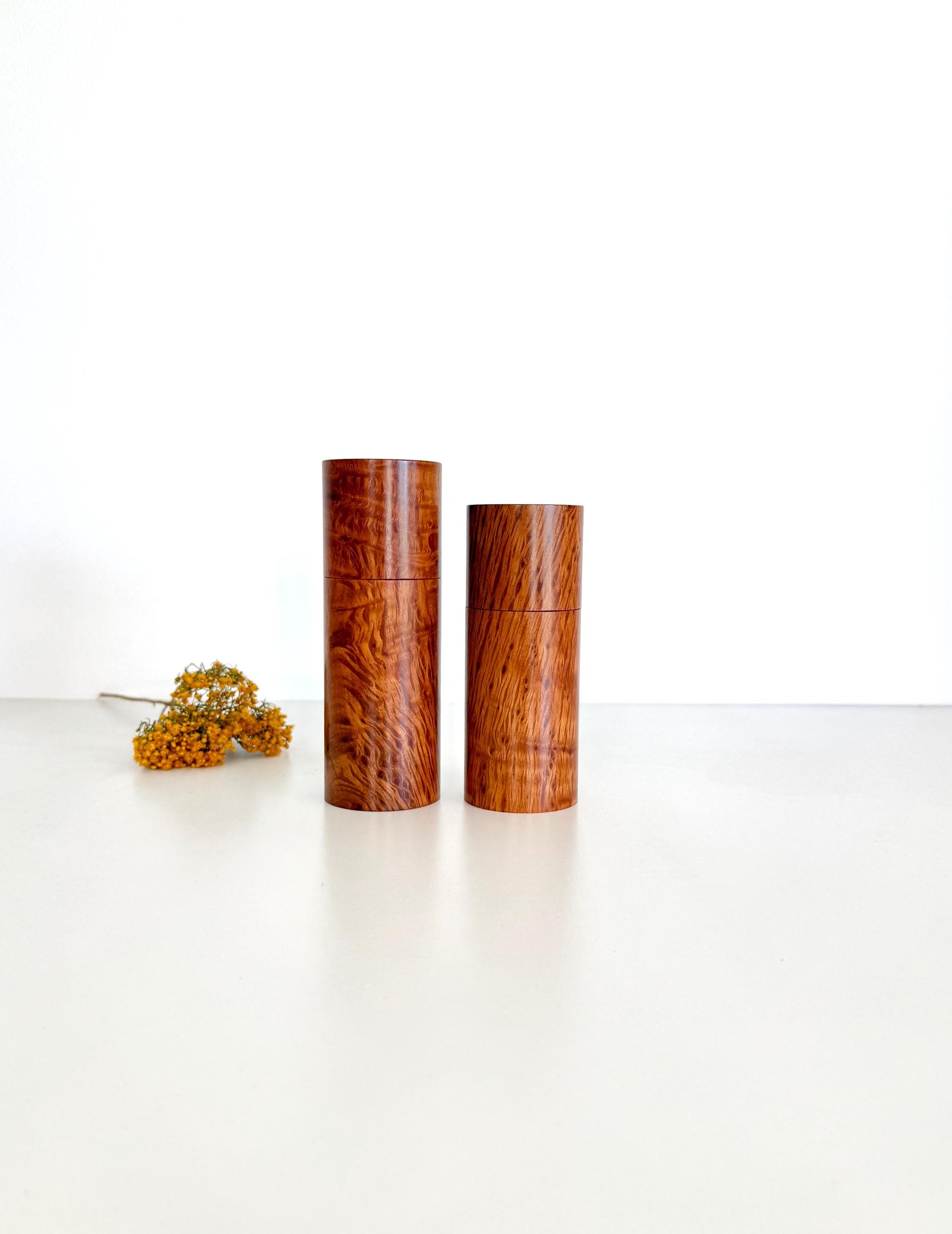 Wooden cylindrical shape salt and pepper grinders made from Sheoak timber