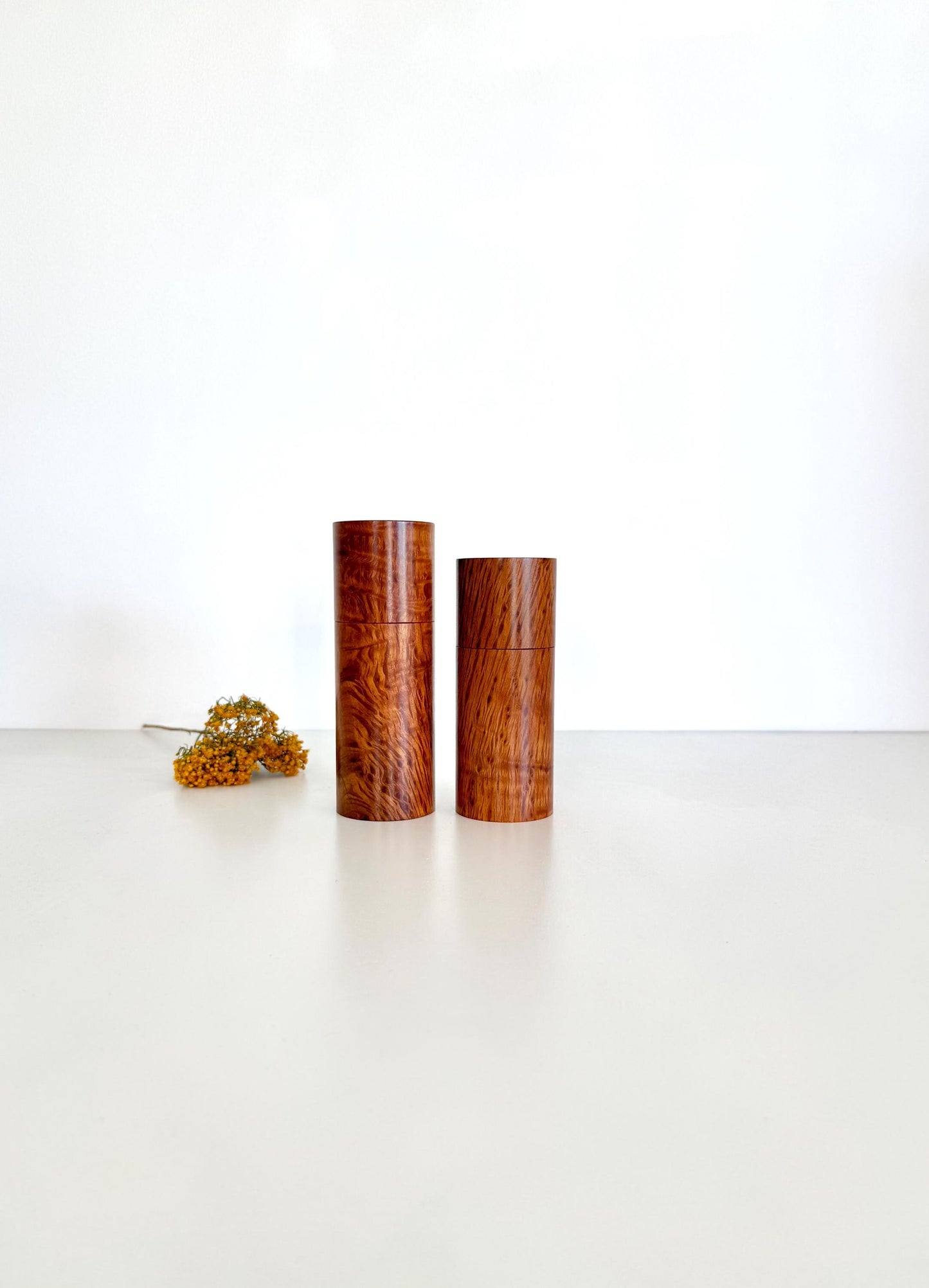 Wooden cylindrical shape salt and pepper grinders made from Sheoak timber