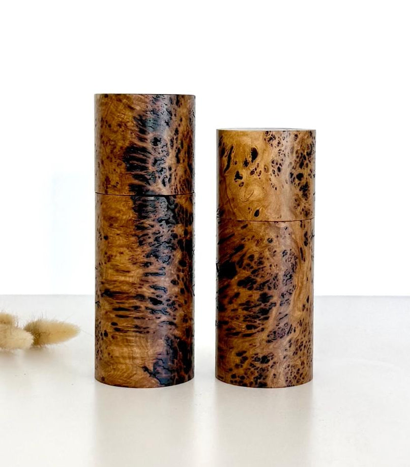Wooden cylindrical shape salt and pepper grinders made from Rib Fruited Mallee timber