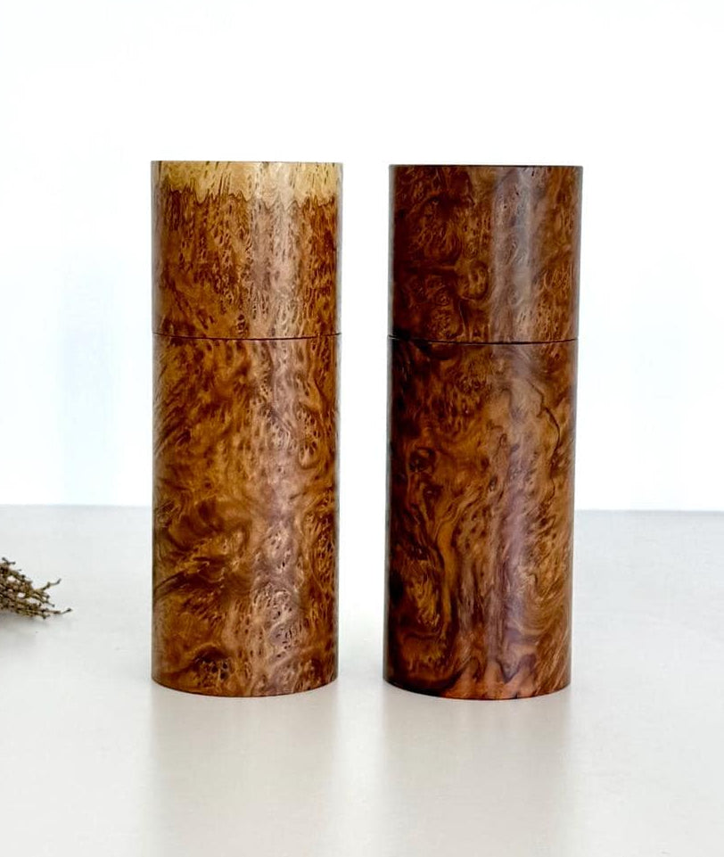Wooden cylindrical shape salt and pepper grinders made from Rib Fruited Mallee timber