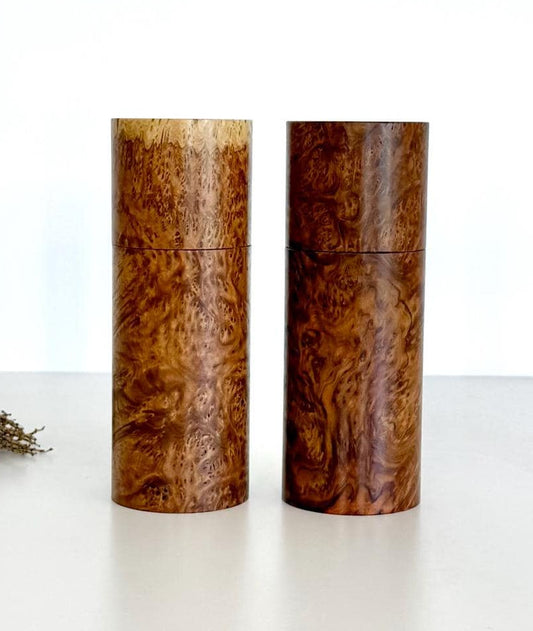 Wooden cylindrical shape salt and pepper grinders made from Rib Fruited Mallee timber