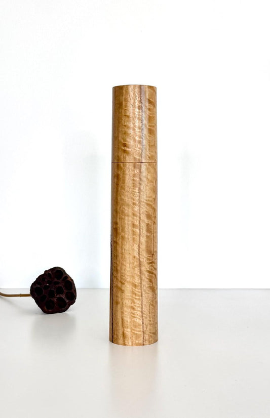 Wooden cylindrical shape salt and pepper grinder made from Curly Marri timber