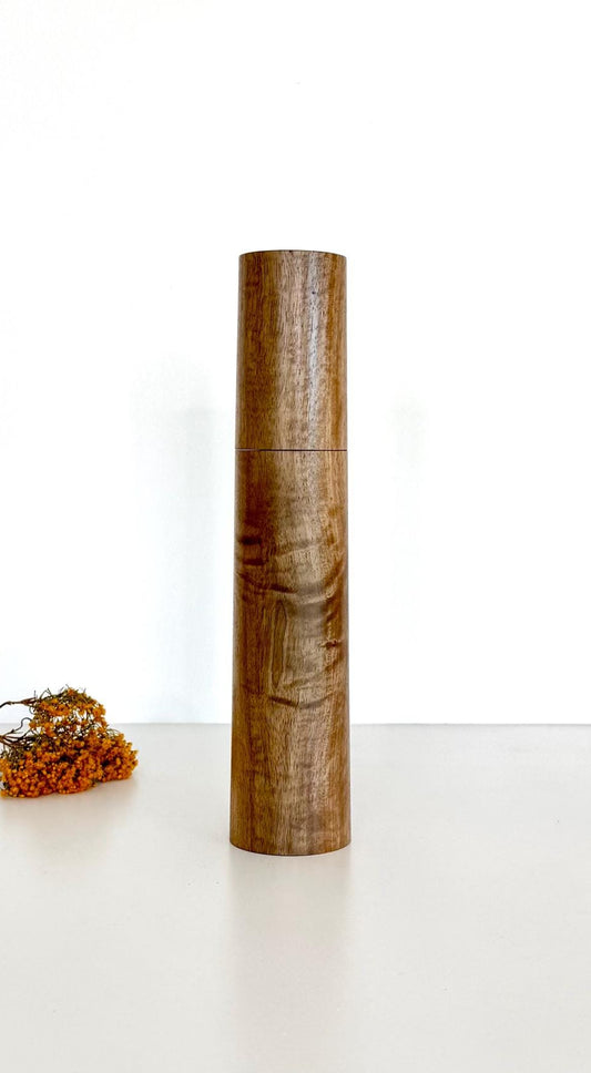 Wooden cylindrical shape salt and pepper grinder made from Walnut timber
