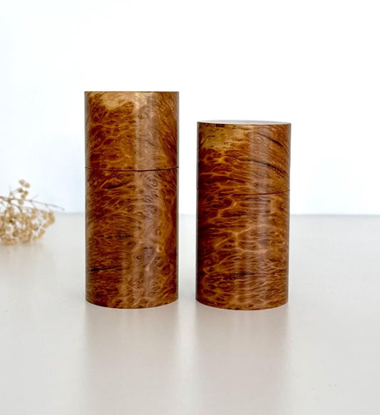 Wooden cylindrical shape salt and pepper grinders made from Bimble Box Burl timber.