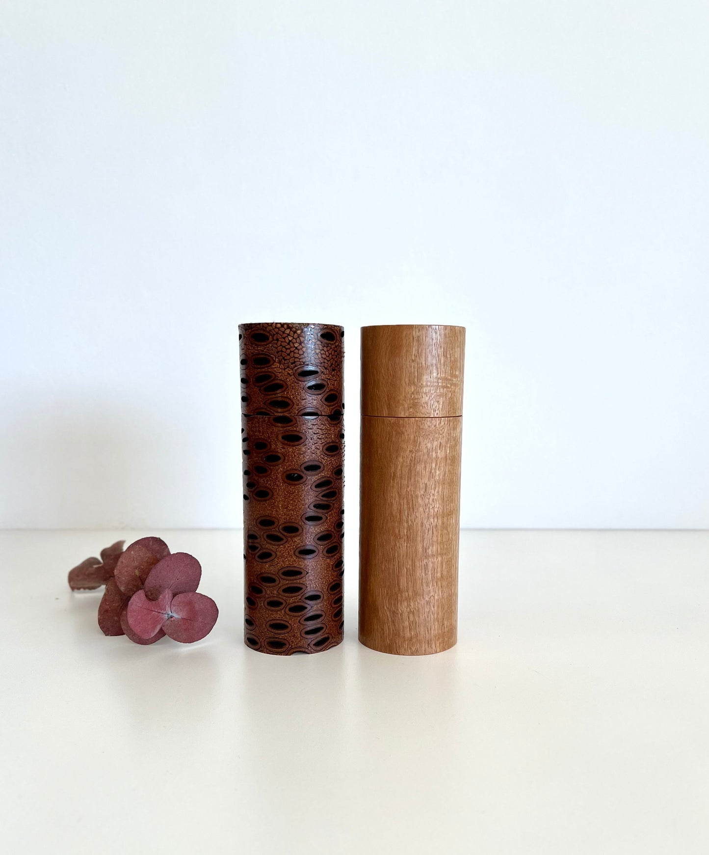 Banksia Seed Pod and Blackbutt salt and pepper grinder set on a white background