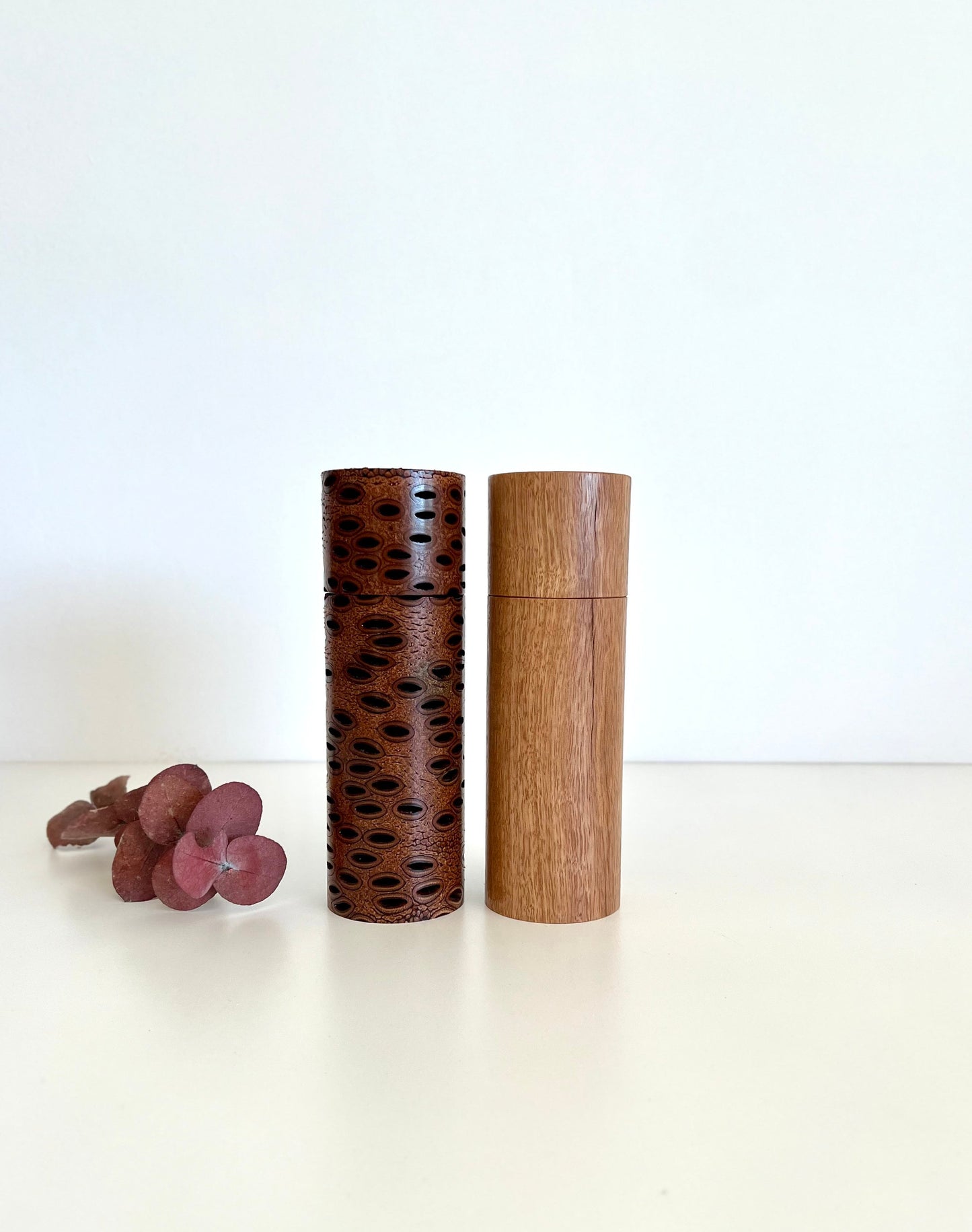 Banksia Seed Pod and Blackbutt salt and pepper grinder set on a white background