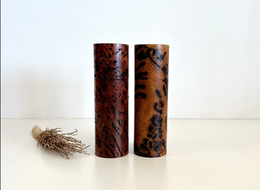 Wooden cylindrical shape salt and pepper grinders made from Australian Bimble box burl and salmon gum burl timbers