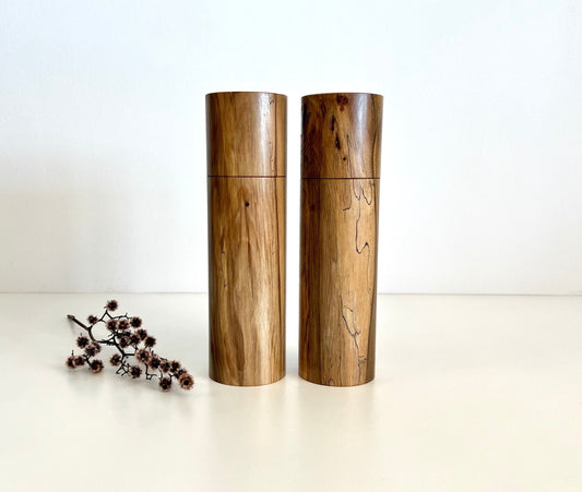 Wooden cylindrical shape salt and pepper grinders made from Australian Black Heart Sassafras timber