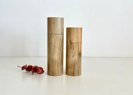 Wooden cylindrical shape salt and pepper grinders made from Norfolk Island Pine timber