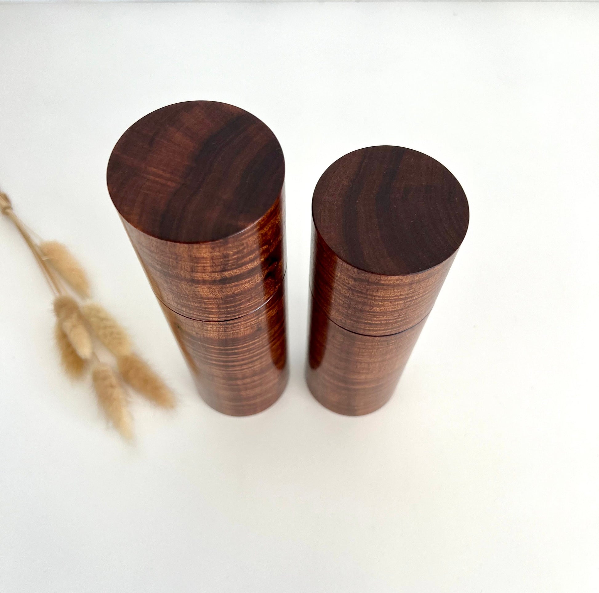 Birdseye view of wooden cylindrical shape salt and pepper grinders made from Australian Western Myall timber