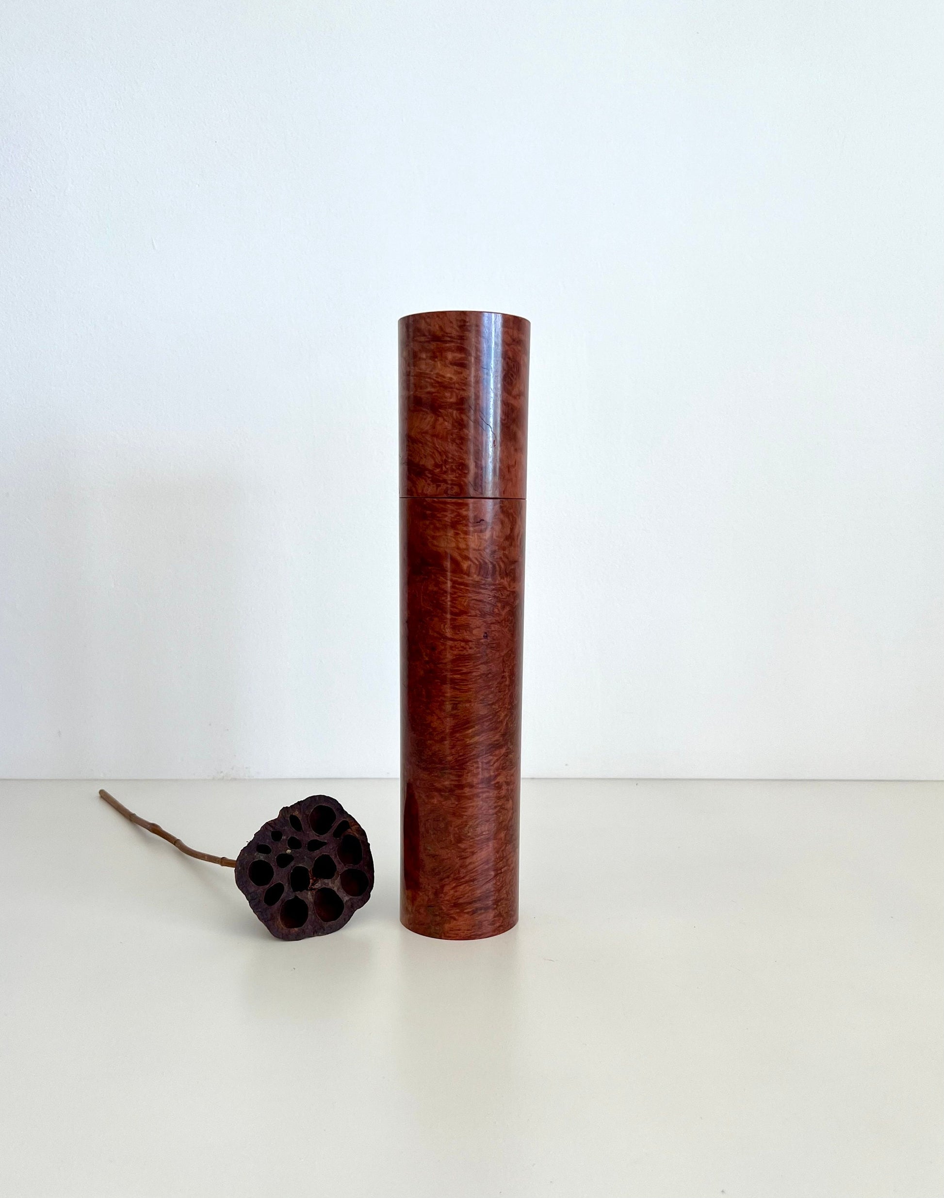 Wooden cylindrical shape salt and pepper grinder made from Australian Red Morrel burl timber