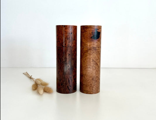 Wooden cylindrical shape salt and pepper grinders made from Australian Gimlet burl and Rib Fruited Mallee burl timbers