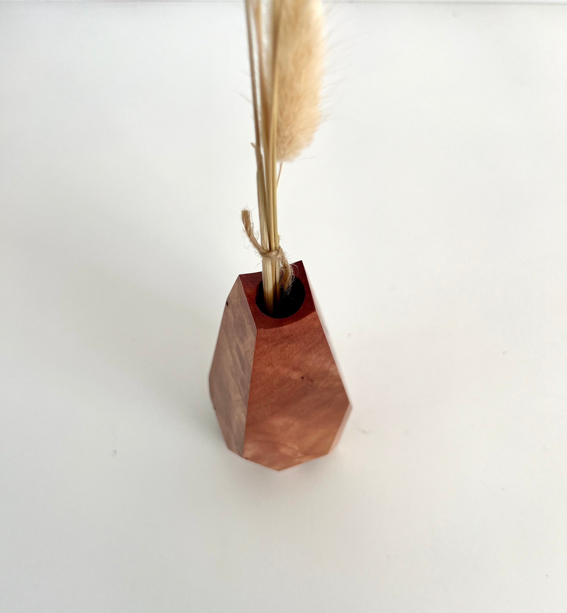 Birdseye view of Wooden Geometric multi-faceted bud vase with dried flowers made from Australian reclaimed timber